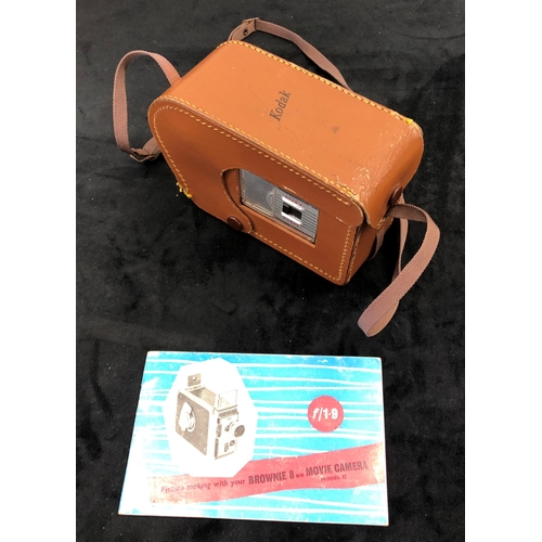 7146 - A Kodak Brownie 8 mm Movie Camera II in brown leather case, with instructions.