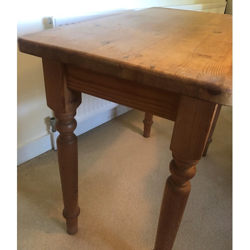 7166 - A small rectangular topped pine table with turned legs, 91cm wide, 50.5cm deep, 78cm high. (Some rub... 