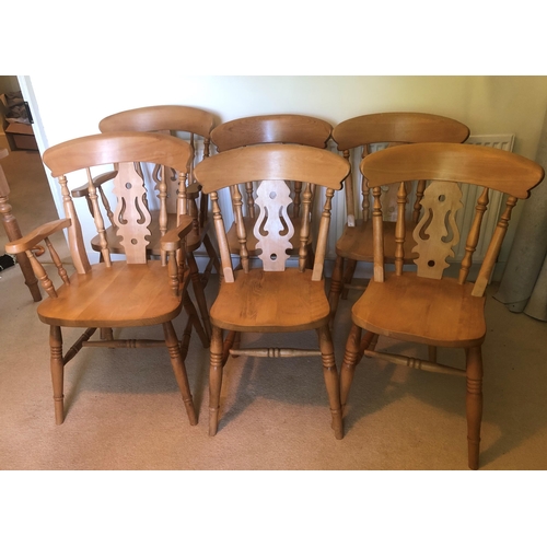 7168 - A set of 6 pine dining chairs, 2 carvers and 4 singles, carvers, 53.5cm wide overall. This item is n... 