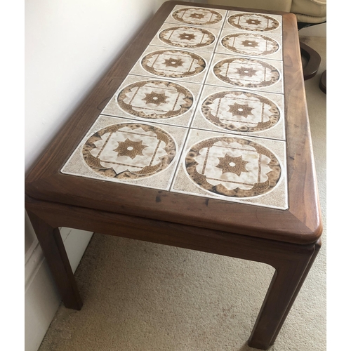 7174 - A vintage rectangular coffee table with tiled top, 112cm wide, 51cm deep, 39cm high. (Some water mar... 