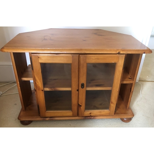 7177 - A pine TV/media cabinet with 2 glazed panel doors enclosing interior shelf, 81cm wide, 53cm deep, 54... 