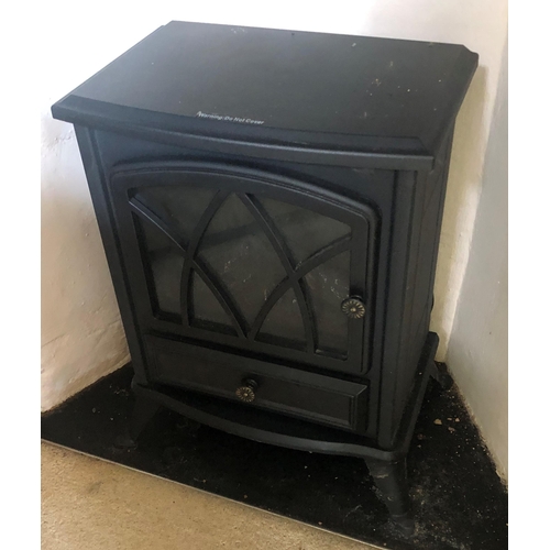 7190 - A Cooper of Stortford portable electric stove heater with original instructions, numbered 9856, 38cm... 