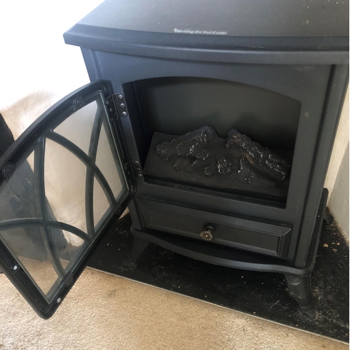 7190 - A Cooper of Stortford portable electric stove heater with original instructions, numbered 9856, 38cm... 