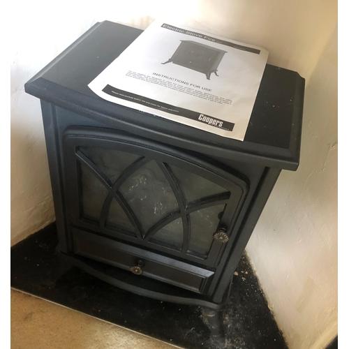 7190 - A Cooper of Stortford portable electric stove heater with original instructions, numbered 9856, 38cm... 