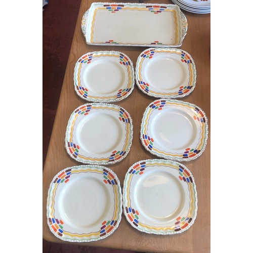 7192 - A Grindley hand painted part tea set, Harlequin pattern 784431, 5 small tea plates, 1 saucer and 1 r... 