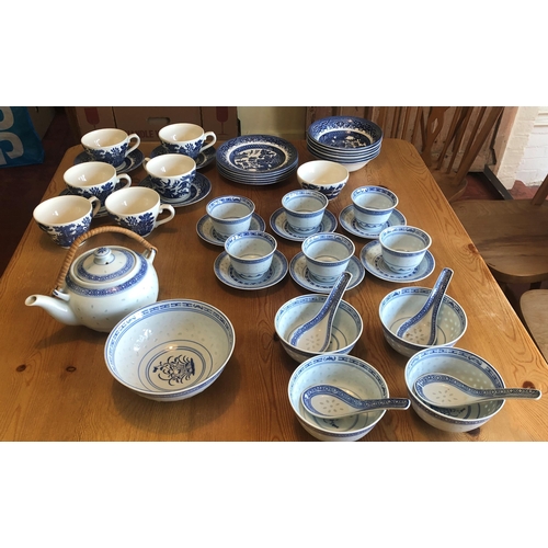 7193 - A Chinese blue and white set of 6 cups and saucers, teapot, 1 small bowl, 4 rice bowls with spoons a... 