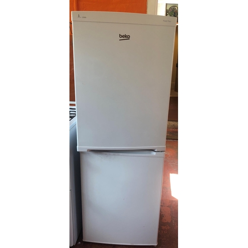 7213 - A Beko A+ Class Frost Free fridge freezer model CXF525W, 54cm wide, 55 deep, 152cm high. (In use). T... 