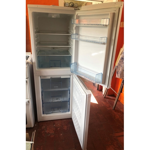 7213 - A Beko A+ Class Frost Free fridge freezer model CXF525W, 54cm wide, 55 deep, 152cm high. (In use). T... 