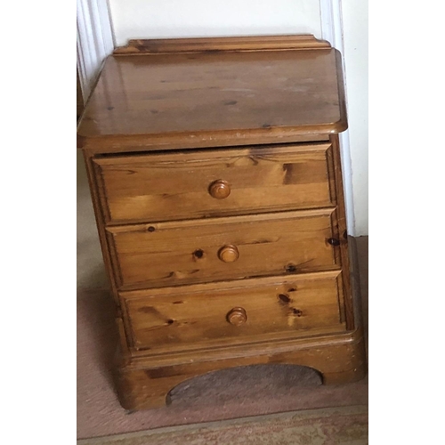 7232 - A pair of Ducal pine bedside cupboards each with 3 drawers, knob handles, 48cm wide, 45cm deep, 61cm... 