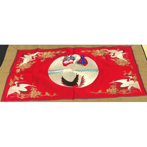 7240 - A red silk fabric table centre with embroidered birds and flowers with brown borders and backing, 10... 