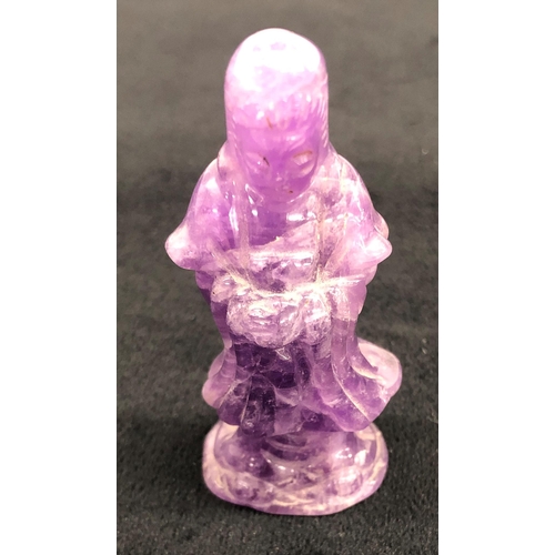 7246 - A purple stone deity, 6.5cm high