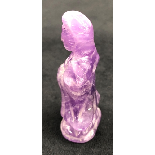 7246 - A purple stone deity, 6.5cm high