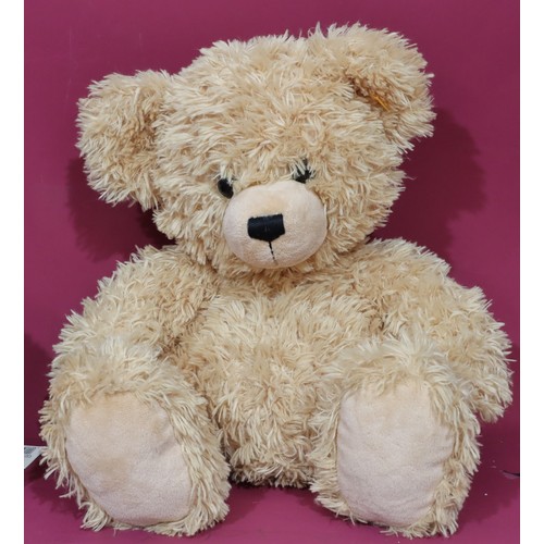 675 - A modern Steiff long haired teddy bear, 43cm high