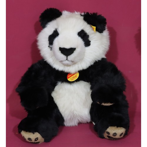 676 - A modern Steiff Manschli panda, 32cm high