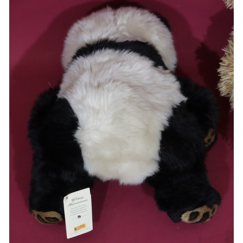 676 - A modern Steiff Manschli panda, 32cm high