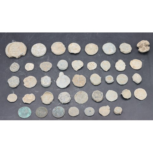 479 - A quantity of various uncleaned coins, tokens and metal detected finds