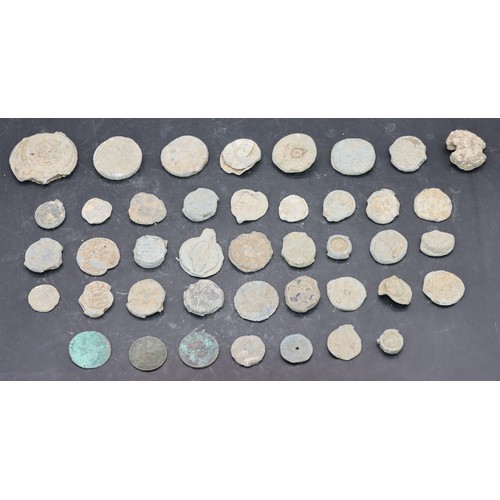 479 - A quantity of various uncleaned coins, tokens and metal detected finds