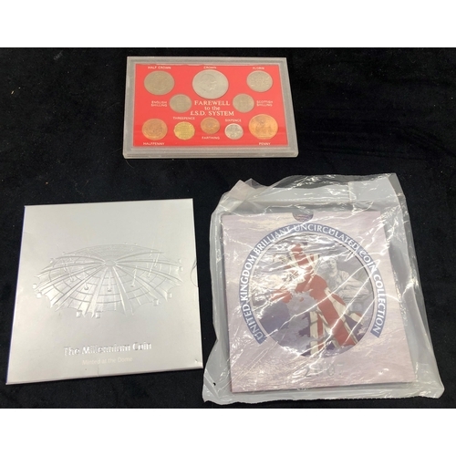 7035 - A Farewell to the £S.D. System coin set under plastic, a Royal Mint The Millennium Coin and a 2007 U... 