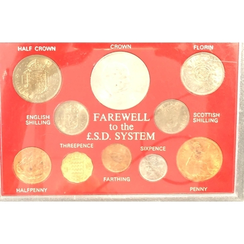 7035 - A Farewell to the £S.D. System coin set under plastic, a Royal Mint The Millennium Coin and a 2007 U... 