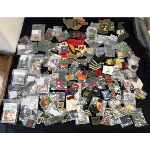 7036 - A large quantity of various military patches, including Ghurkha, Desert Rat, Nepal Armed Police Forc... 