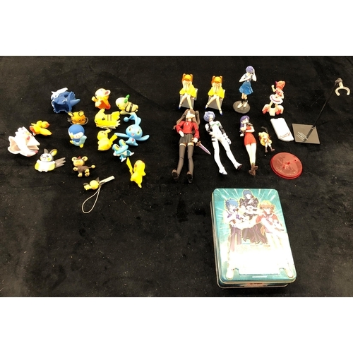 7045 - Various Tomy Pokémon figures, a  Yu-Gi-Oh Trading card game, Duelist Collection and various Gainax H... 