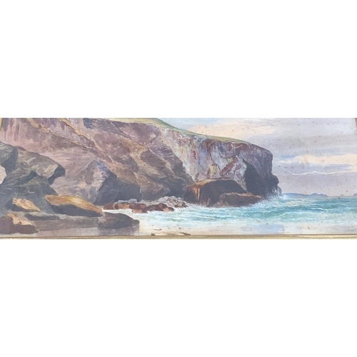 7053 - A watercolour of rocks and sea, 49 x 20cm in gilt frame. (Stains and chips to frame).