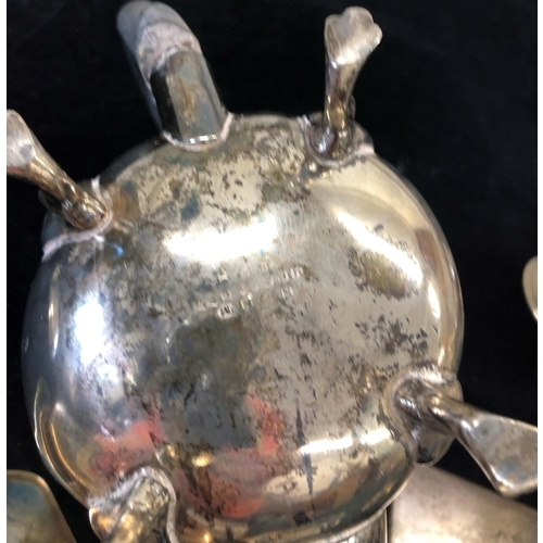 7051 - A silver plated muffin dish, teapot (handle loose), 8 goblets and a pair of sugar nips.