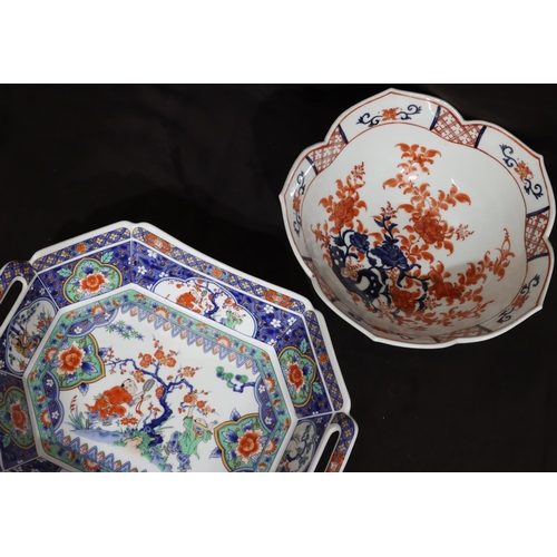 124 - An Oriental 2-handled dish on white, blue, red and green ground with figure, floral, leaf, scroll an... 