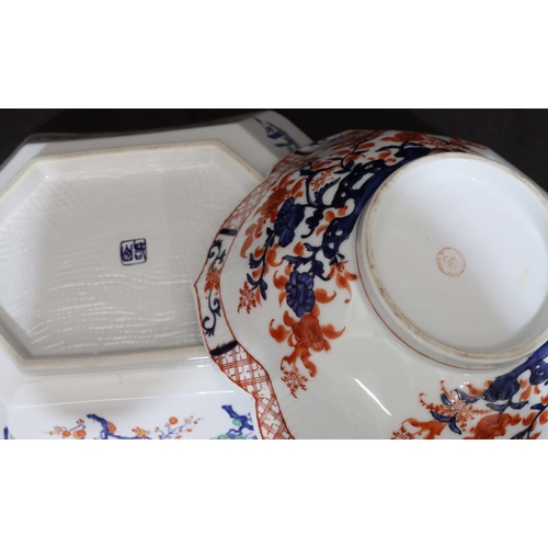 124 - An Oriental 2-handled dish on white, blue, red and green ground with figure, floral, leaf, scroll an... 