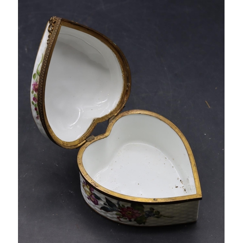 161 - A 19th/20th Century Continental porcelain heart shaped trinket box with basket weave decoration and ... 