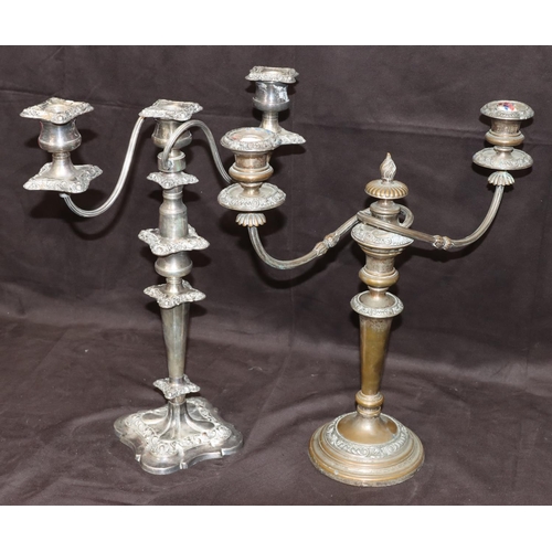 279 - A silver plated 3-light 2-branch candelabra with embossed floral and scroll decoration on square sca... 