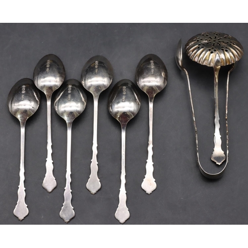 214 - A George V set of 6 silver teaspoons with matching sugar tongs and a sugar sifter in fitted black le... 