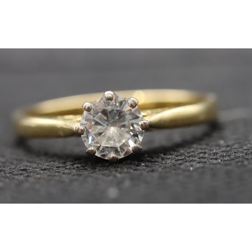 427 - An 18ct gold solitaire diamond ring, approx. 0.50 carat, size N, 2.3 grams gross, (white in colour a... 