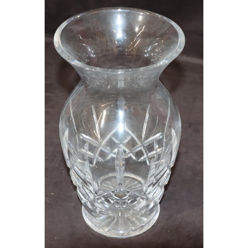 79 - A Waterford cut glass round bulbous thin necked trumpet shaped vase, 25.5cm high (Boxed)