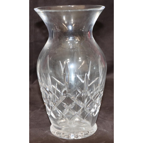 79 - A Waterford cut glass round bulbous thin necked trumpet shaped vase, 25.5cm high (Boxed)