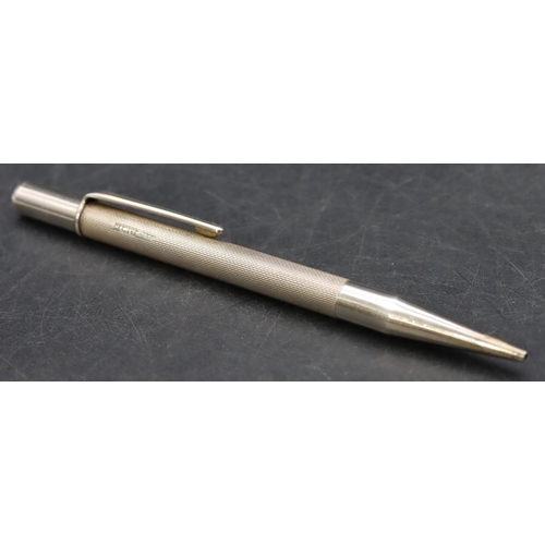 250 - An Elizabeth II silver propelling pencil inscribed 