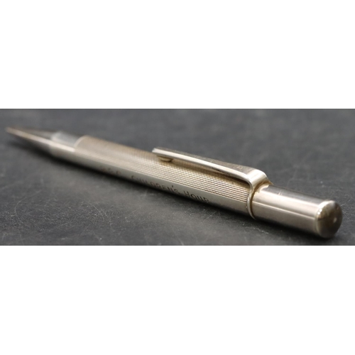 250 - An Elizabeth II silver propelling pencil inscribed 