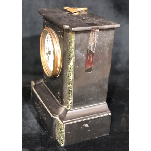 8024 - A slate 8- day striking mantel clock with white dial and Roman numerals, stamped EJ Heather, Reigate... 