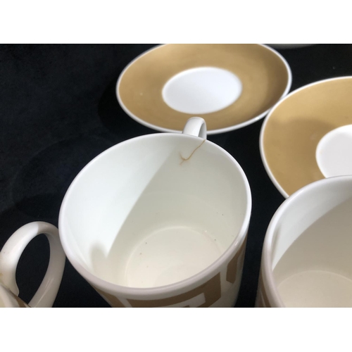 8027 - A Wedgwood Susie Cooper porcelain Keystone pattern part coffee service, Old Gold design, 6 cups (1 c... 