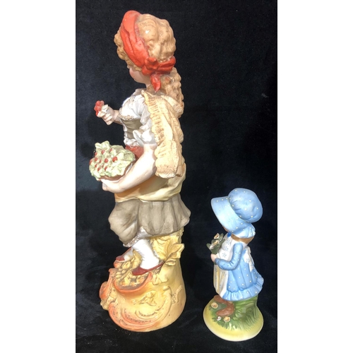 8031 - A Holly Hobbie Creation hand painted figure of a girl, 21cm high, a similar larger figure of a lady ... 