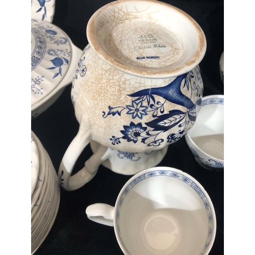 8033 - J & G Meakin Blue Nordic pattern service, 1 large jug, 1 smaller jug, 2 sugar bowls (1 chipped), 4 d... 