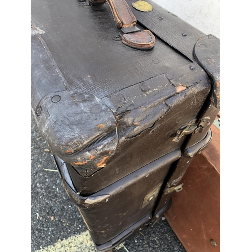 8056 - A vintage cabin trunk, 77 x 50 x 31cm (some damage to corners) and a canvas suitcase, 77 x 44 x 23cm... 