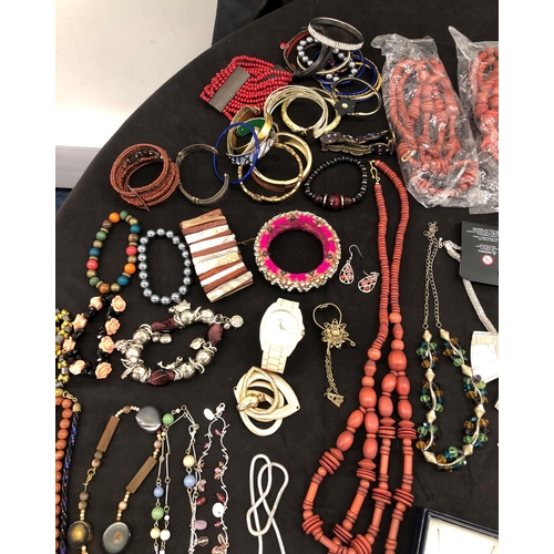 8066 - A large quantity of various costume jewellery, necklaces, bracelets, earrings, cufflinks etc.