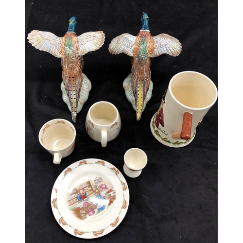 8081 - A pair of Beswick pheasants no. 849 and 850 (1 wing cracked and 1 wing chipped to underside, a music... 