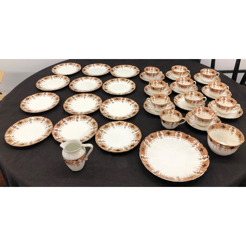 8088 - A part tea service stamped Blairs China, 10 side plates, 1 serving dish, 1 jug, 11 cups (2 cracked) ... 