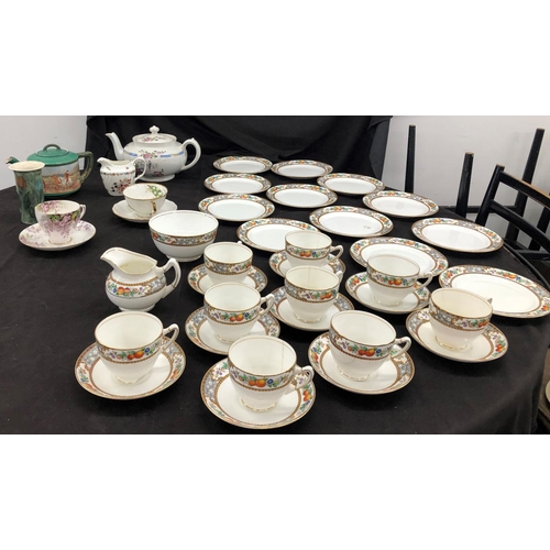 8089 - A part Paragon china tea service with fruit pattern, 12 side plates, 9 cups (4 cracked), 9 saucers, ... 