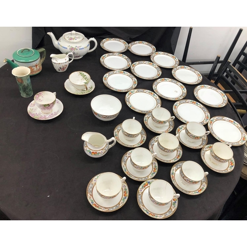 8089 - A part Paragon china tea service with fruit pattern, 12 side plates, 9 cups (4 cracked), 9 saucers, ... 