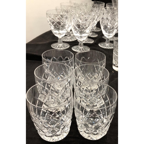 8111 - A large quantity of cut glass, 2 decanters, a part dressing table set, small wine glasses, vases etc... 