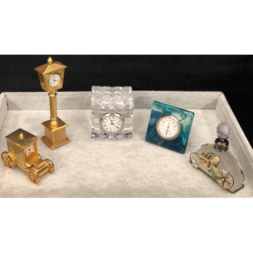 8112 - 4 small novelty timepieces, 1 Waterford glass, 1 blue tinted glass Caithness, 1 Churchill lamp post ... 