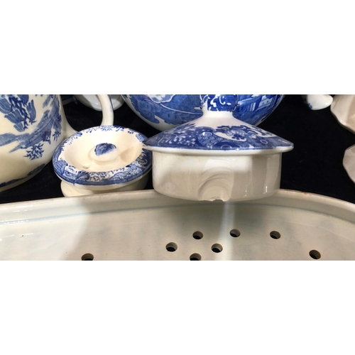 8119 - A quantity of blue and white china including a Spode meat platter (chipped), other Spode, Mason's an... 